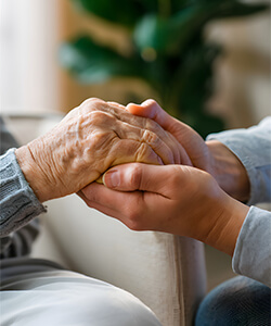 Family member supporting an older relative with dementia